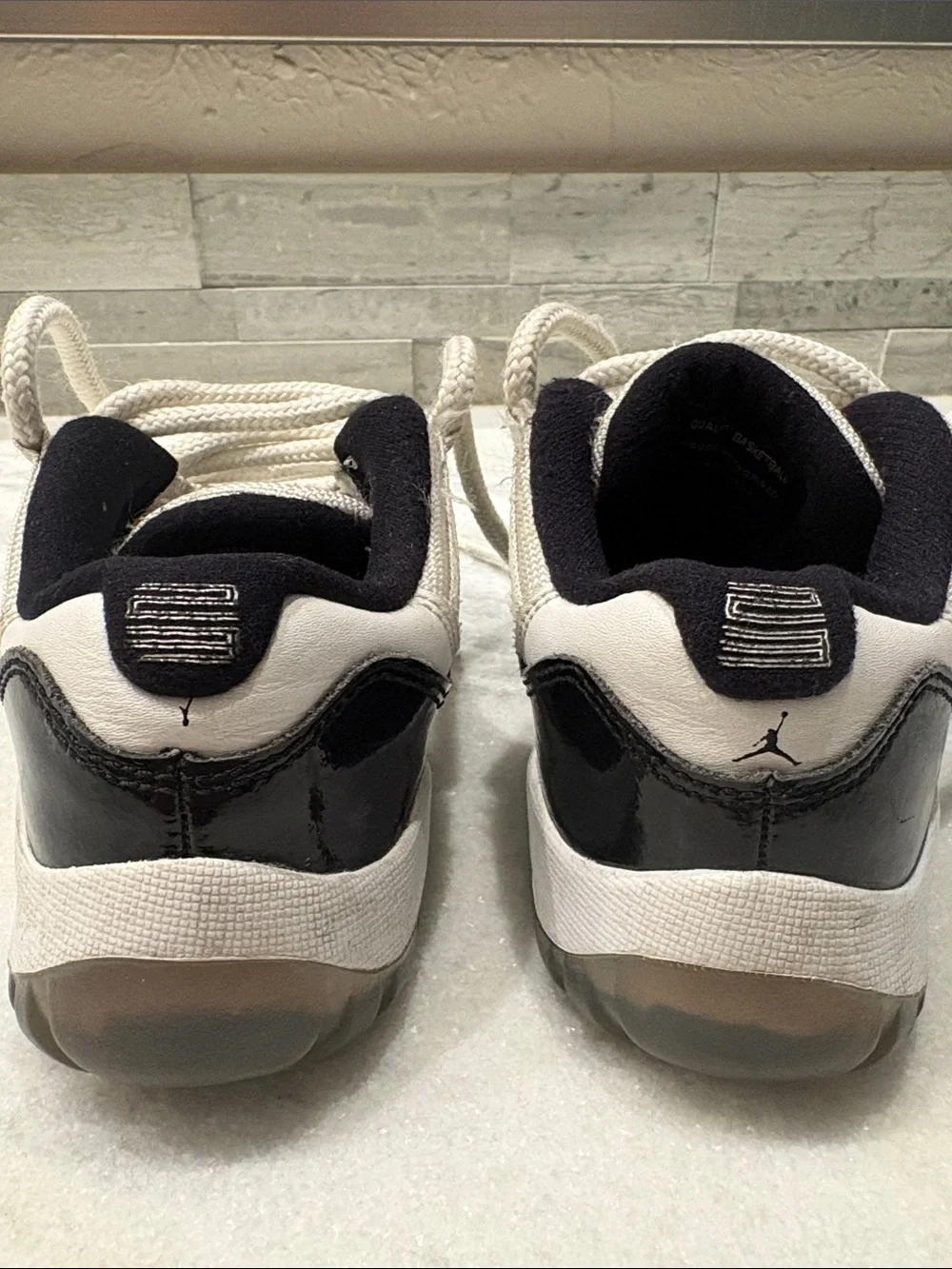 Jordan Kids Black and White Low-Top Retro Sneakers